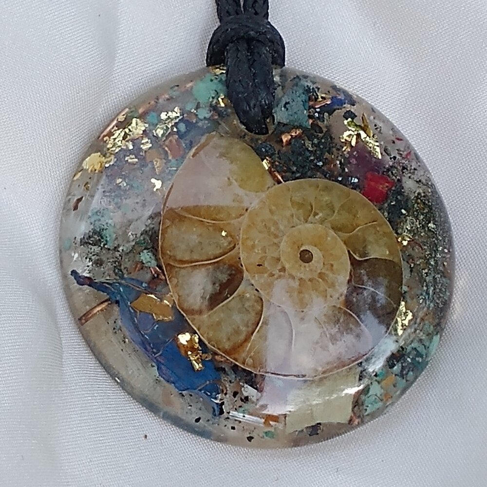 Orgonite necklace with sea shell logarithmic spiral